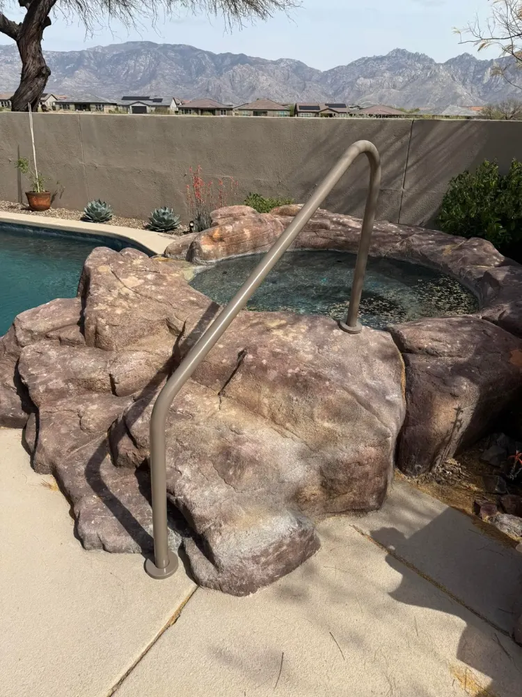 Equipment and pool edge on a Tucson repair job