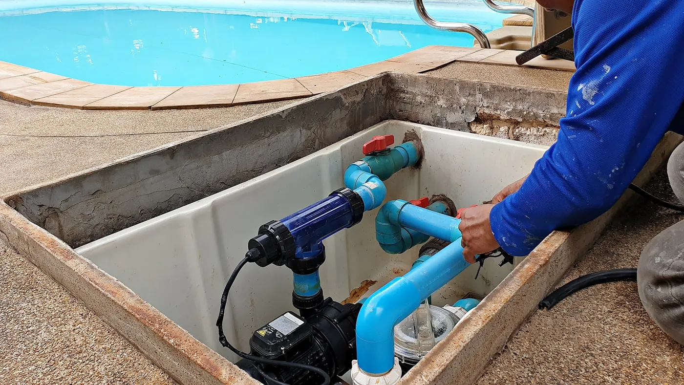 Pool pump and plumbing at a Tucson equipment pad